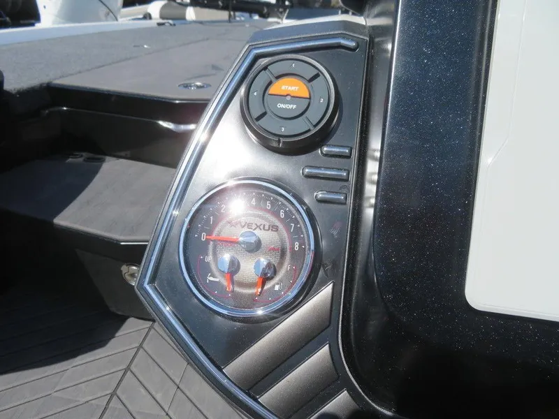 Slide: The Image of 2023 Vexus VX20 boat dashboard with start button and gauge. - 25