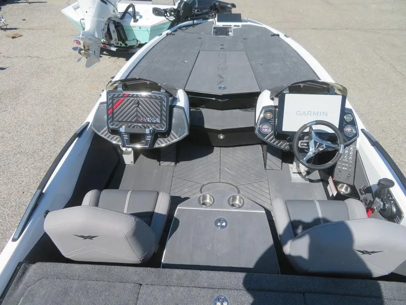 Slide: The Image of 2023 Vexus VX20 boat interior with dual Garmin displays and seating. - 29
