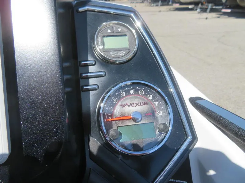 Slide: The Image of 2023 Vexus VX20 boat dashboard with speedometer and digital display. - 30
