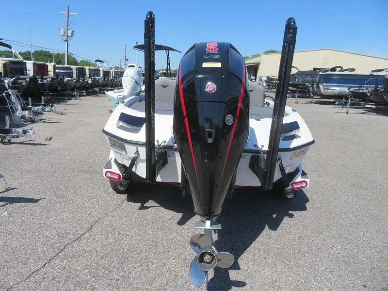 Slide: The Image of 2023 Vexus VX20 boat rear view with outboard motor in a dealership lot. - 5
