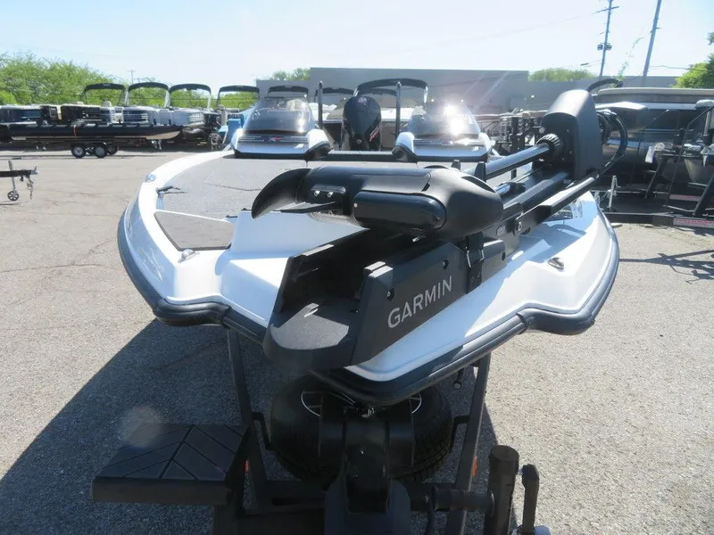Slide: The Image of 2023 Vexus VX20 boat with Garmin equipment in a dealership lot. - 7