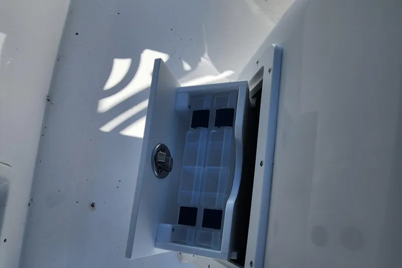 Slide: The Image of Open storage compartment on a 2024 Cape Horn 22 OS boat. - 7
