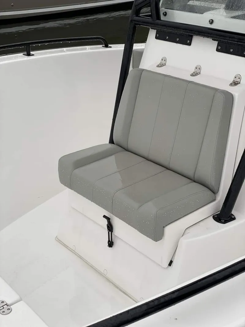 Slide: The Image of 2024 Cape Horn 22 OS boat with cushioned seating. - 13