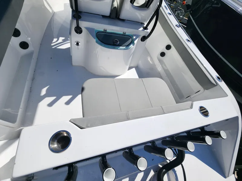 Slide: The Image of 2024 Cape Horn 22 OS boat interior with seating and rod holders. - 4