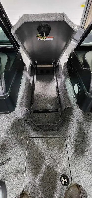 Slide: The Image of 2023 Lowe Fish & Ski 18 interior storage compartment. - 8