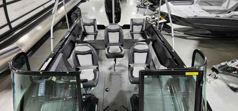 Slide: The Image of 2023 Lowe Fish & Ski 18 boat interior with seating and windshield. - 9