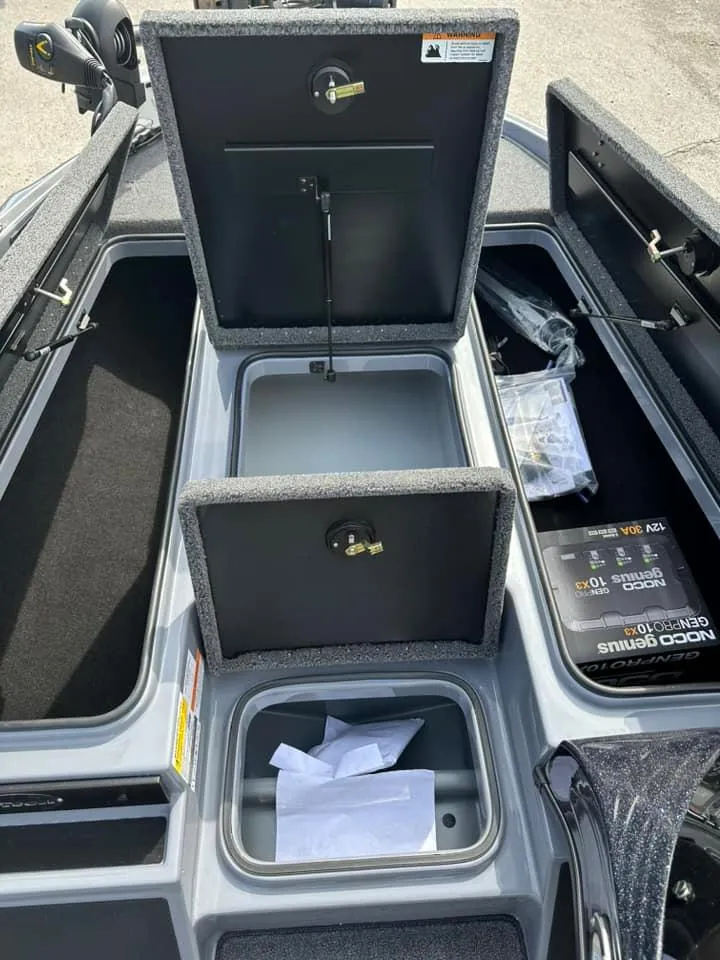 Slide: The Image of 2024 Triton 179 TrX boat storage compartments and livewell. - 2