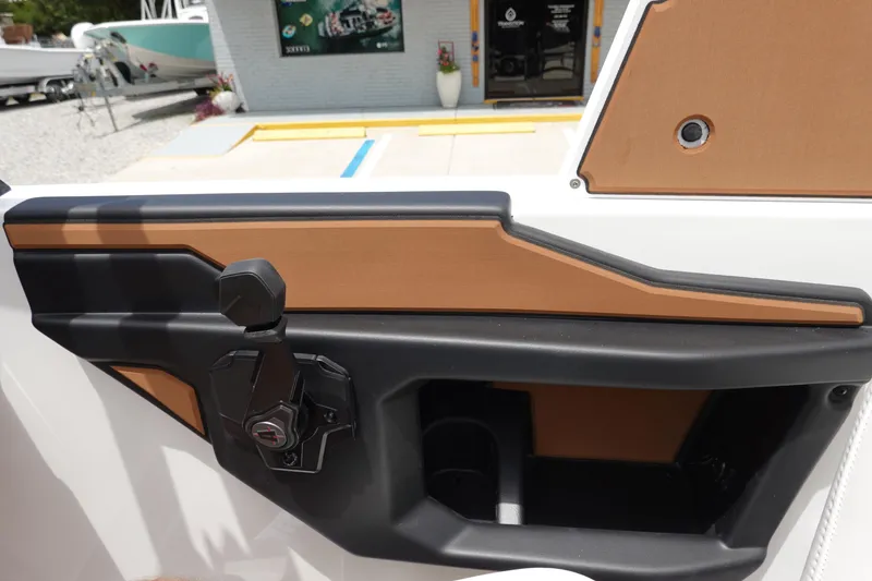Slide: The Image of 2023 Axis A24 boat interior door panel with sleek design and modern features. - 24