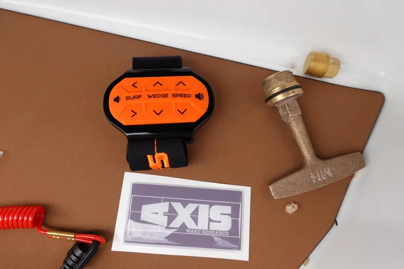 Slide: The Image of Axis A24 2023 surf control panel with accessories on a boat. - 33