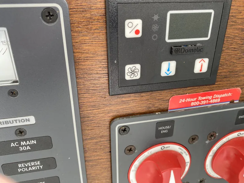 Slide: The Image of Control panel of a 1975 Bertram 28 Flybridge boat. - 17