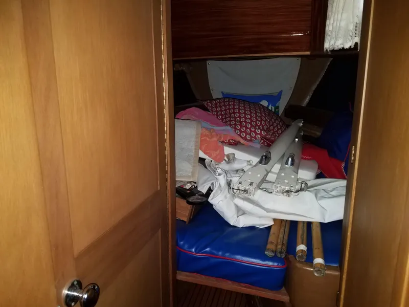 Slide: The Image of Interior cabin of 1969 Allied Seabreeze 35 sailboat with equipment and bedding. - 41