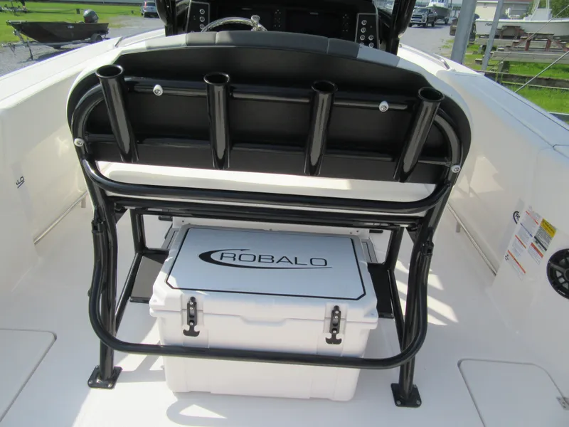 Slide: The Image of 2023 Robalo R250 CC boat interior with storage and seating. - 3