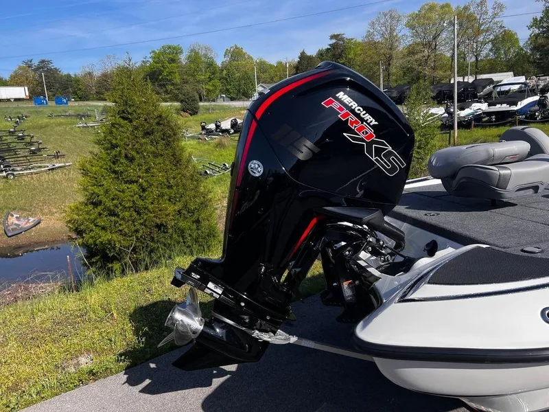 Slide: The Image of 2023 Triton 179 TrX boat with Mercury Pro XS outboard motor. - 11