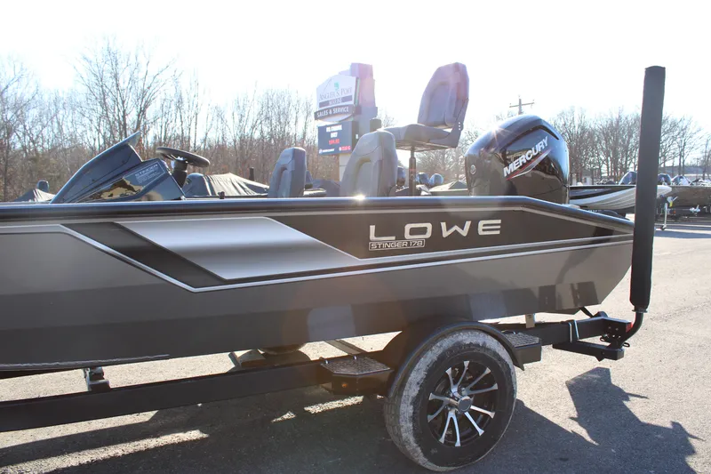 Slide: The Image of 2023 Lowe ST178 boat with Mercury engine on trailer. - 3