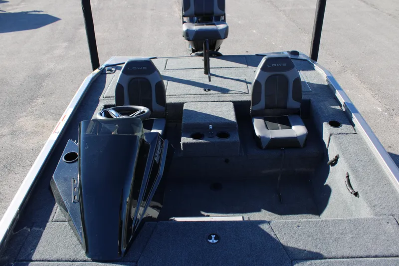 Slide: The Image of 2023 Lowe ST178 fishing boat interior with dual seats and steering console. - 5