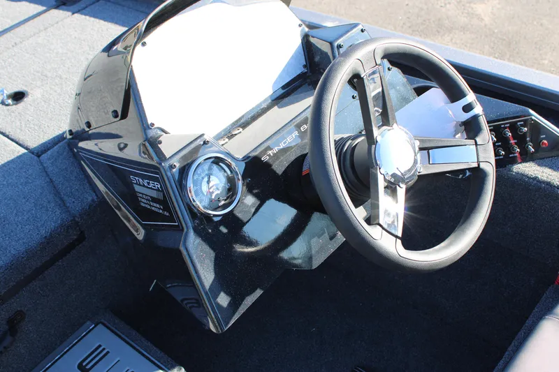Slide: The Image of 2023 Lowe ST178 boat steering console and dashboard. - 7