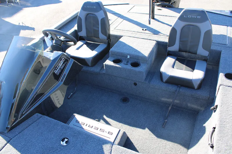 Slide: The Image of 2023 Lowe ST178 boat interior with dual seats and steering console. - 8