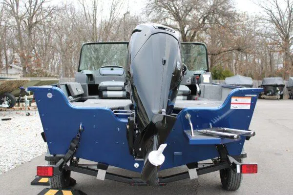 Slide: The Image of 2023 Lowe FM1675 boat with outboard motor, rear view. - 4