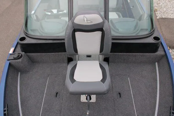 Slide: The Image of 2023 Lowe FM1675 boat interior with a single seat and carpeted deck. - 7