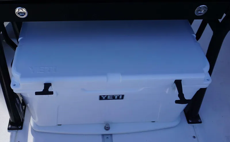 Slide: The Image of White YETI cooler on 2023 Everglades 243 CC boat deck. - 22