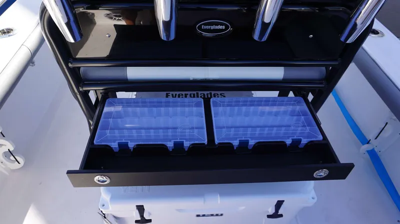 Slide: The Image of 2023 Everglades 243 CC boat with tackle storage and rod holders. - 24