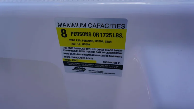 Slide: The Image of Capacity label on 2023 Everglades 243 CC boat, max 8 persons or 1725 lbs. - 30