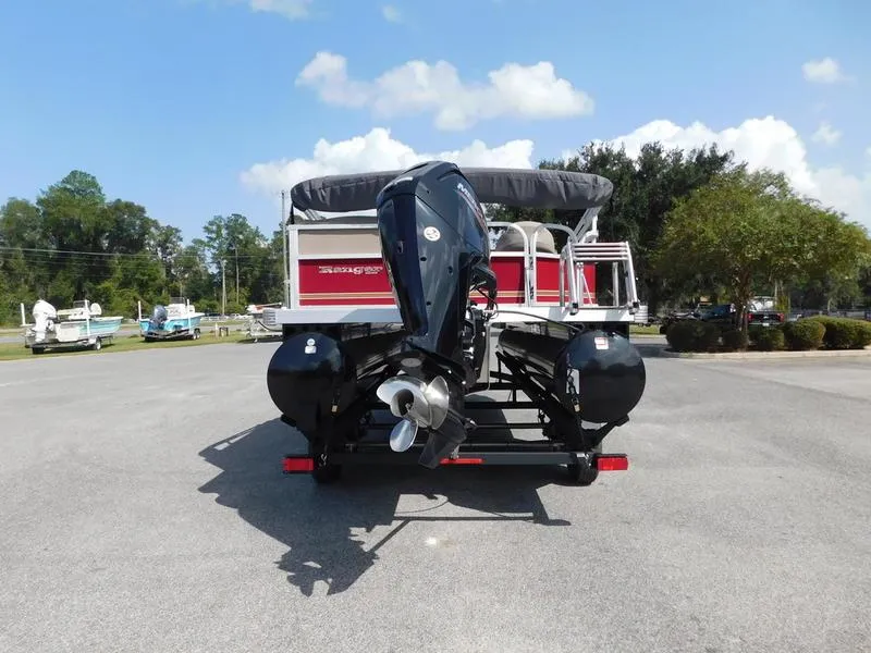 Slide: The Image of 2023 Ranger Reata 200C pontoon boat rear view with outboard motor. - 3