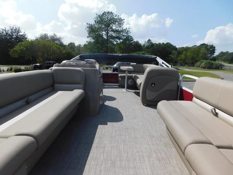 Slide: The Image of 2023 Ranger Reata 200C pontoon boat interior with spacious seating and modern design. - 4