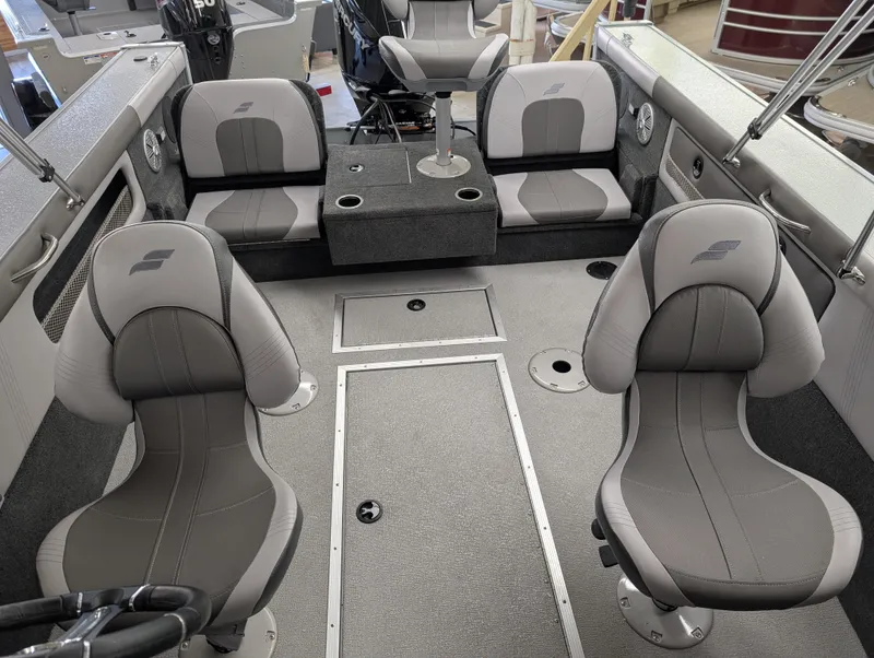 Slide: The Image of 2023 Starcraft Superfisherman 186 boat interior with gray seating and modern design. - 9