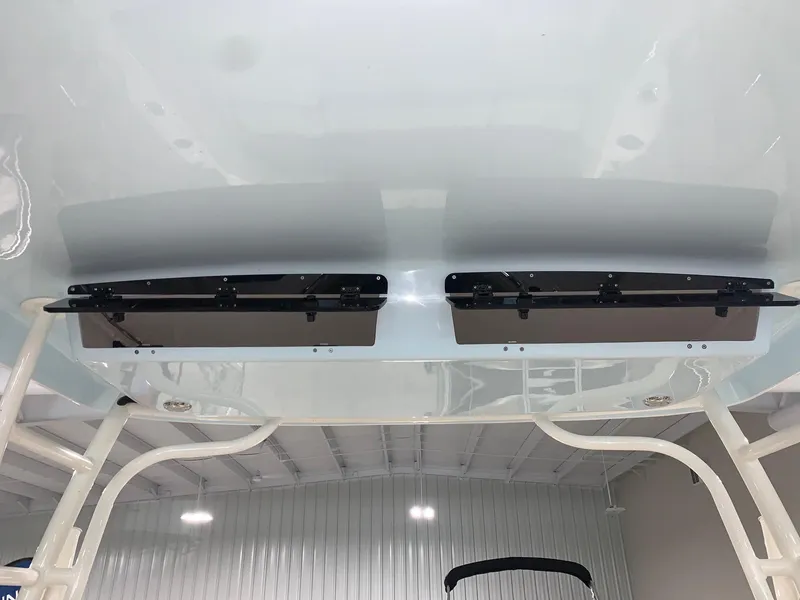 Slide: The Image of 2024 Key West 239 DFS boat underside view in a showroom. - 18