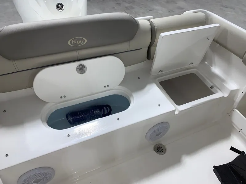 Slide: The Image of 2024 Key West 239 DFS boat interior storage compartments and seating. - 21