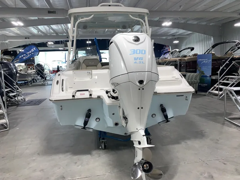 Slide: The Image of 2024 Key West 239 DFS boat with 300 V6 engine in showroom. - 3