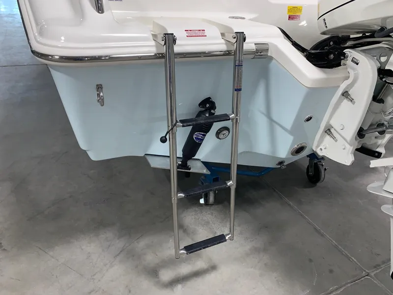 Slide: The Image of 2024 Key West 239 DFS boat with a stainless steel swim ladder. - 4