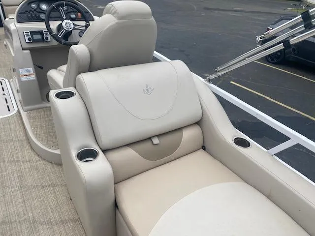 Slide: The Image of Luxury seating on a 2017 JC 245 TT Spirit boat with beige upholstery. - 16