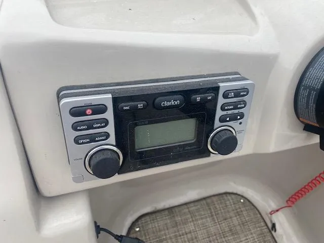 Slide: The Image of Clarion audio system in a 2017 JC 245 TT Spirit boat. - 19