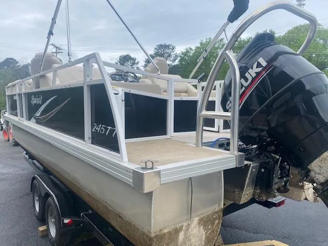 Slide: The Image of 2017 JC 245 TT Spirit pontoon boat with Suzuki outboard motor on trailer. - 5