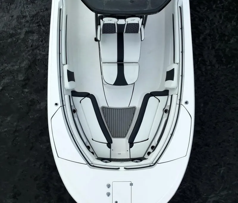 Slide: The Image of Top view of a 2020 Tidewater 32 boat with white and black seating. - 16