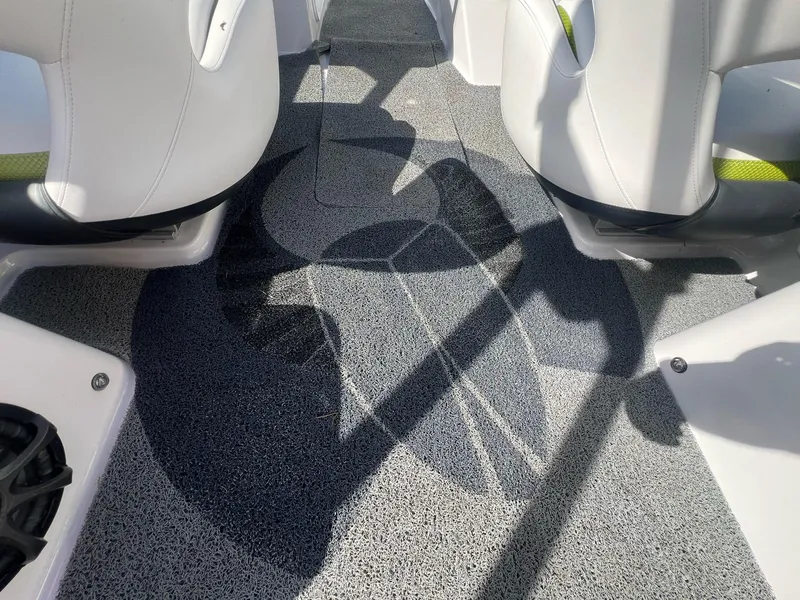 Slide: The Image of 2014 Scarab 195 HO Impulse boat interior with stylish seating and textured flooring. - 11