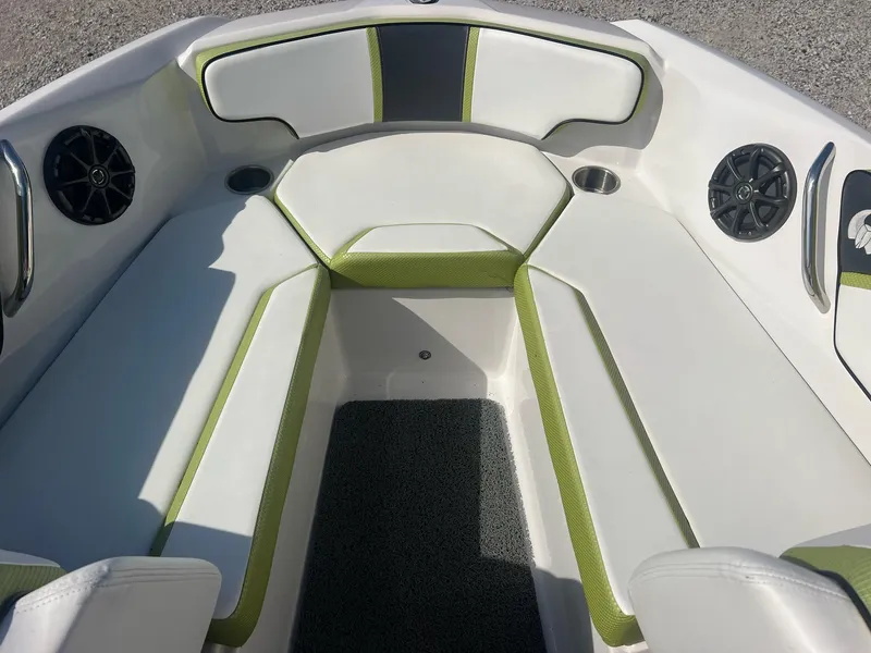 Slide: The Image of 2014 Scarab 195 HO Impulse boat interior with white and green seating. - 15