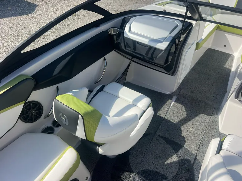 Slide: The Image of 2014 Scarab 195 HO Impulse boat interior with white and green seating. - 26