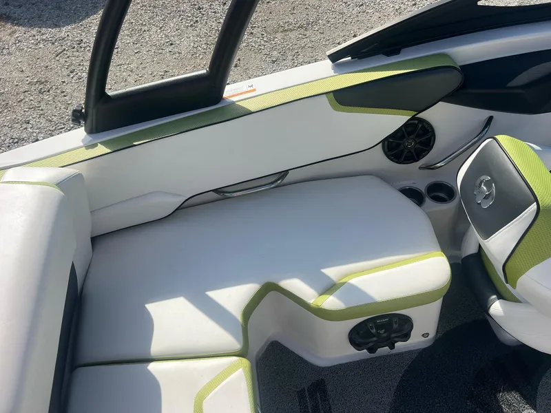 Slide: The Image of 2014 Scarab 195 HO Impulse boat interior with white and green seating. - 27