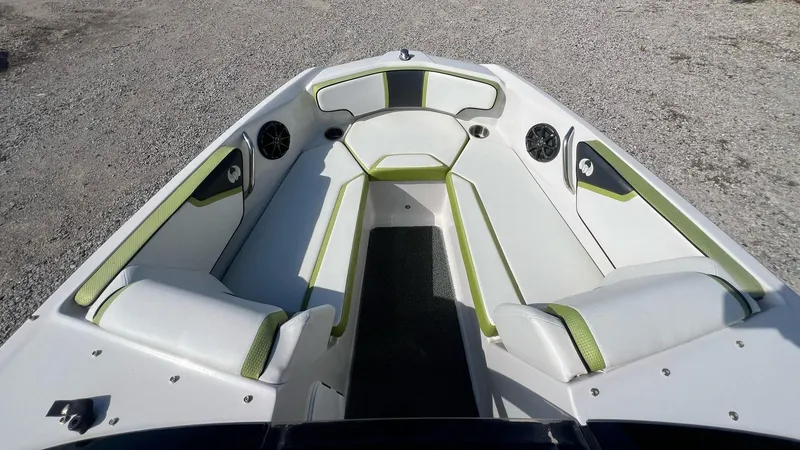 Slide: The Image of 2014 Scarab 195 HO Impulse boat interior with white and green seating. - 4