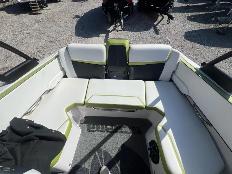 Slide: The Image of 2014 Scarab 195 HO Impulse boat interior with white and green seating. - 7