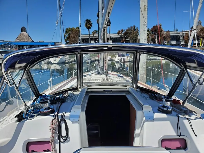 Slide: The Image of 2014 Beneteau Oceanis 34 sailboat cockpit view in marina. - 22