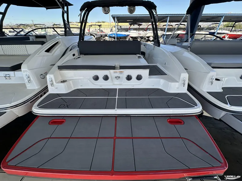 Slide: The Image of 2023 Bayliner DX2050 boat with spacious deck and modern design. - 3