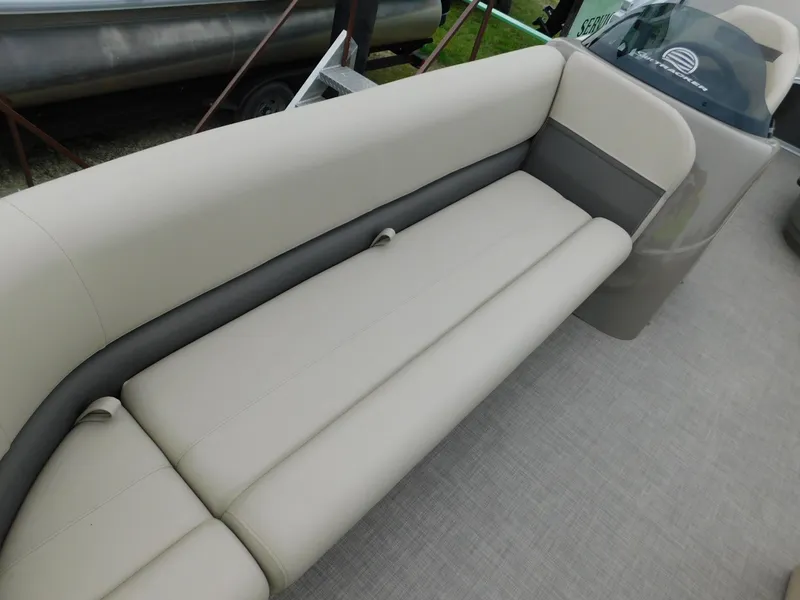 Slide: The Image of 2023 Sun Tracker Party Barge 18 DLX pontoon boat with beige seating. - 7
