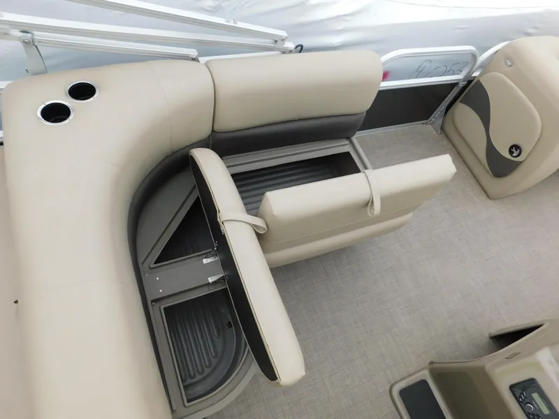 Slide: The Image of 2023 Sun Tracker Party Barge 18 DLX interior seating and storage compartments. - 8