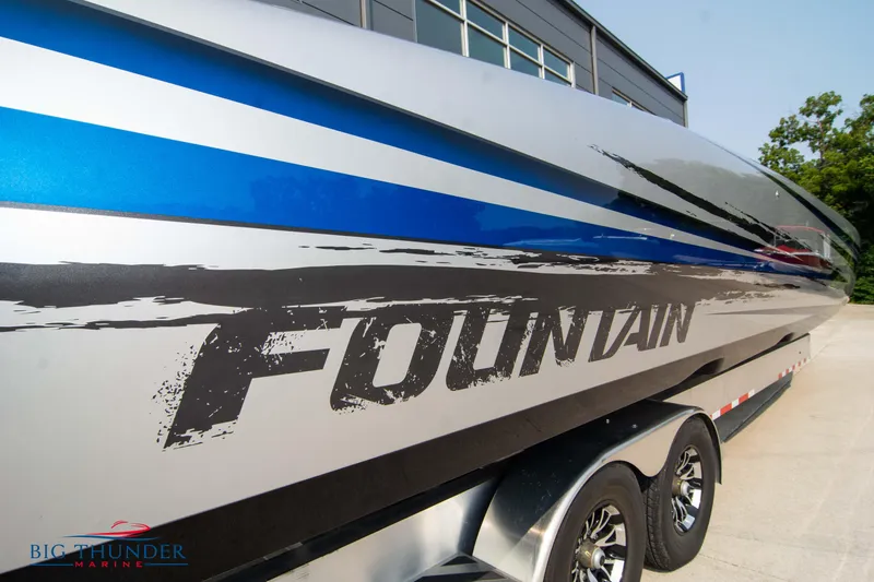 Slide: The Image of 2025 Fountain 34 Thunder Cat boat on trailer, side view. - 19