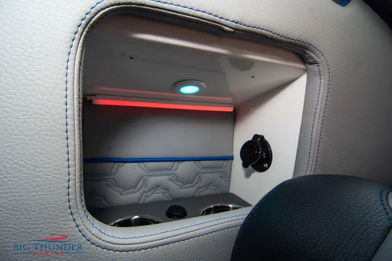 Slide: The Image of Interior storage compartment of 2025 Fountain 34 Thunder Cat boat with LED lighting. - 25
