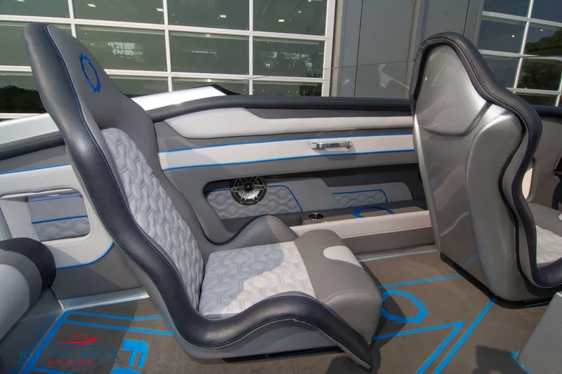 Slide: The Image of Interior seating of 2025 Fountain 34 Thunder Cat boat with modern design and blue accents. - 29